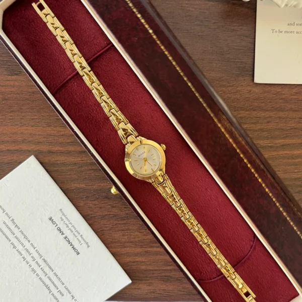 Classic Gold Round Dial Slim Patterned Bracelet Watch for Women