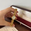 Classic Pale Oval Dial Gold Curved Link Bracelet Watch for Women