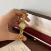 Classic Pale Oval Dial Gold Curved Link Bracelet Watch for Women