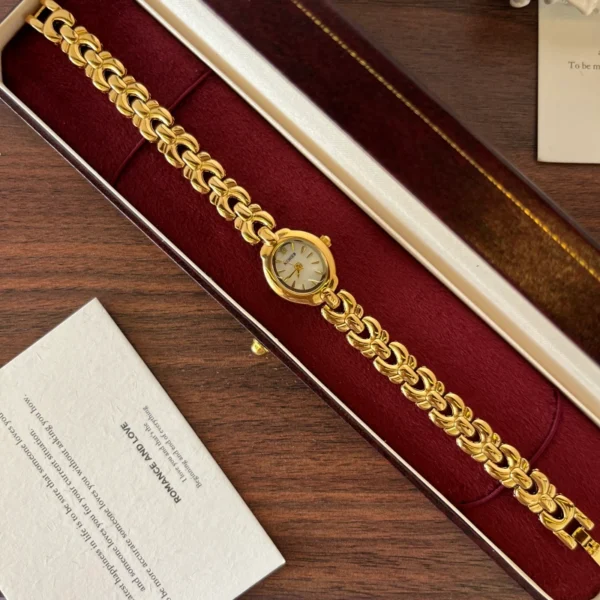Classic Pale Oval Dial Gold Curved Link Bracelet Watch for Women