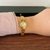 Classic Pale Oval Dial Gold Curved Link Bracelet Watch for Women