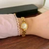 Classic Pale Oval Dial Gold Curved Link Bracelet Watch for Women