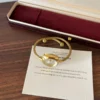 Elegant Pale Oval Dial Gold Open Cuff Watch for Women