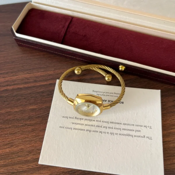 Elegant Pale Oval Dial Gold Open Cuff Watch for Women