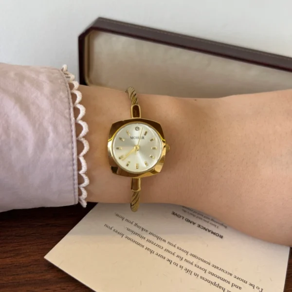 Elegant Pale Oval Dial Gold Open Cuff Watch for Women