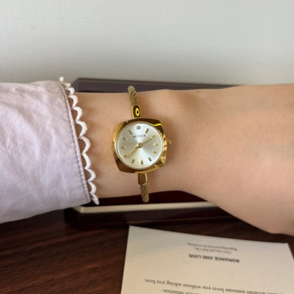 Elegant Pale Oval Dial Gold Open Cuff Watch for Women