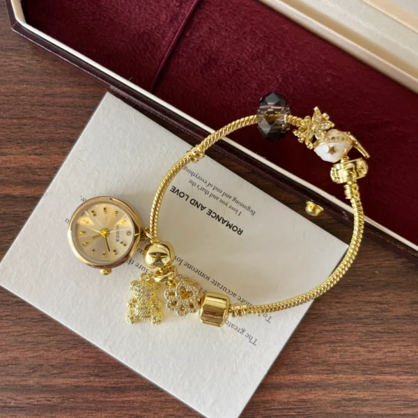 Elegant Gold Round Dial Floral Charm Bangle Watch for Women