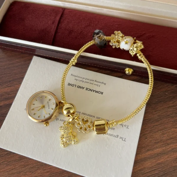 Elegant Gold Round Dial Floral Charm Bangle Watch for Women