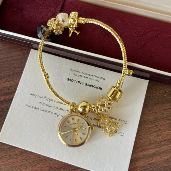 Elegant Gold Round Dial Floral Charm Bangle Watch for Women