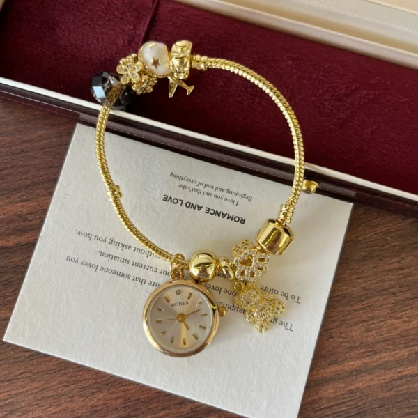 Elegant Gold Round Dial Floral Charm Bangle Watch for Women