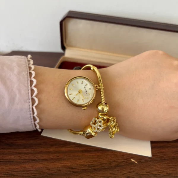 Elegant Gold Round Dial Floral Charm Bangle Watch for Women