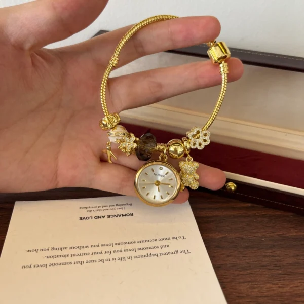 Elegant Gold Round Dial Floral Charm Bangle Watch for Women