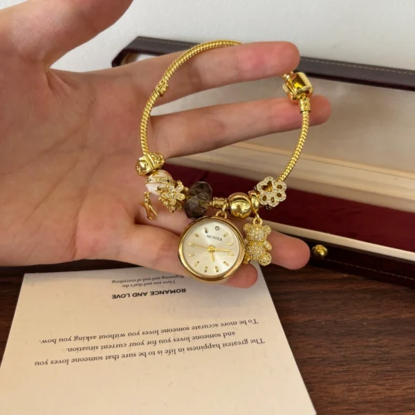 Elegant Gold Round Dial Floral Charm Bangle Watch for Women