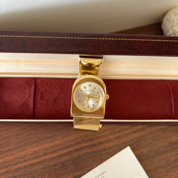 Classic Gold Round Dial Wide Cuff Watch for Women