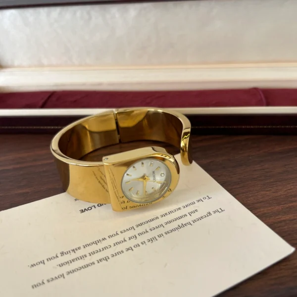 Classic Gold Round Dial Wide Cuff Watch for Women