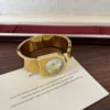 Classic Gold Round Dial Wide Cuff Watch for Women