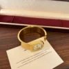 Classic Gold Round Dial Wide Cuff Watch for Women